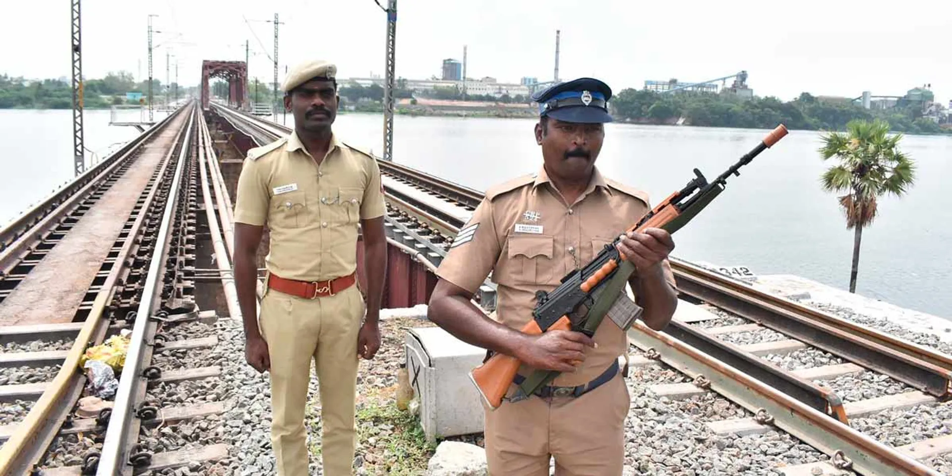  Armed police guard the Cauvery railway bridge
