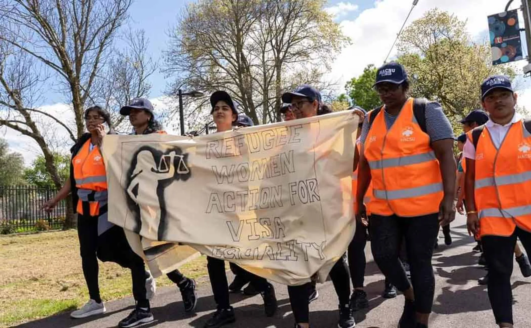 Australian government wants permanent visa for 10 thousand people women walk 