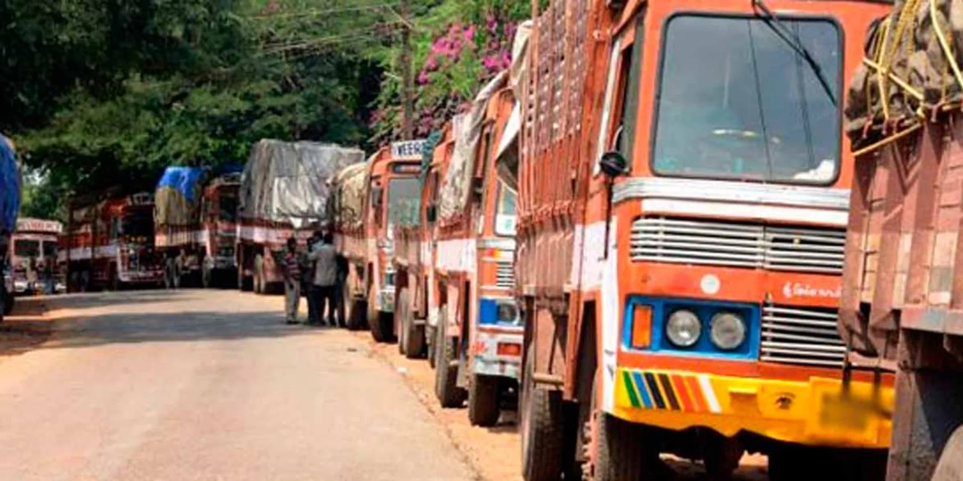 Trucks parked here and there; Strike against tax hike