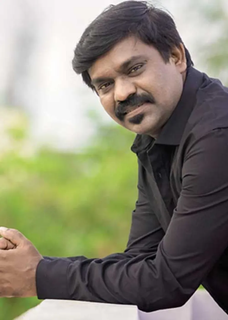 /idhalgal/eniya-utayam/country-singer-velmurugans-journey-my-singing-carriage-meeting-dr-4
