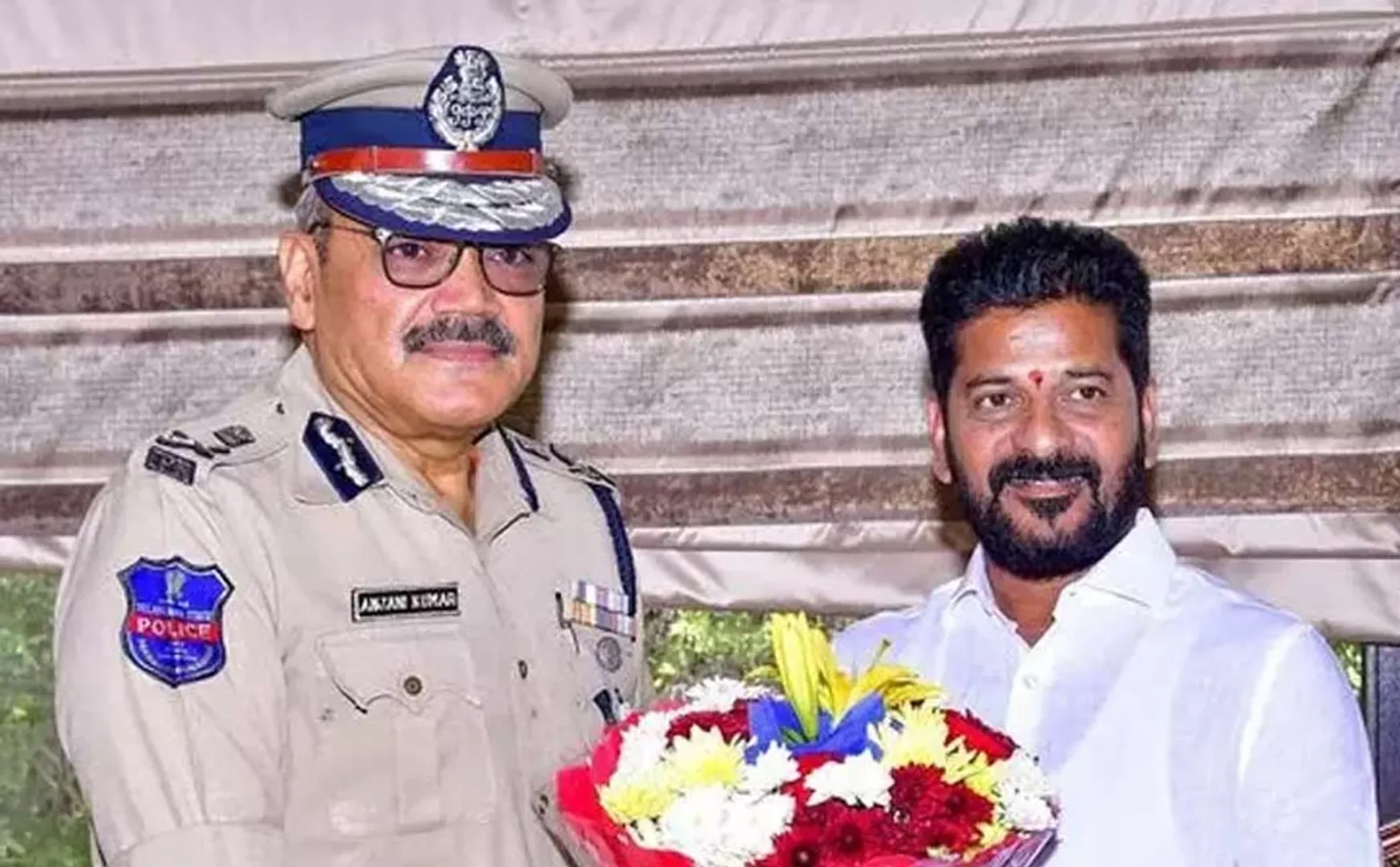 Suspension order of Telangana DGP revoked for Meeting with CM  Revanth Reddy;