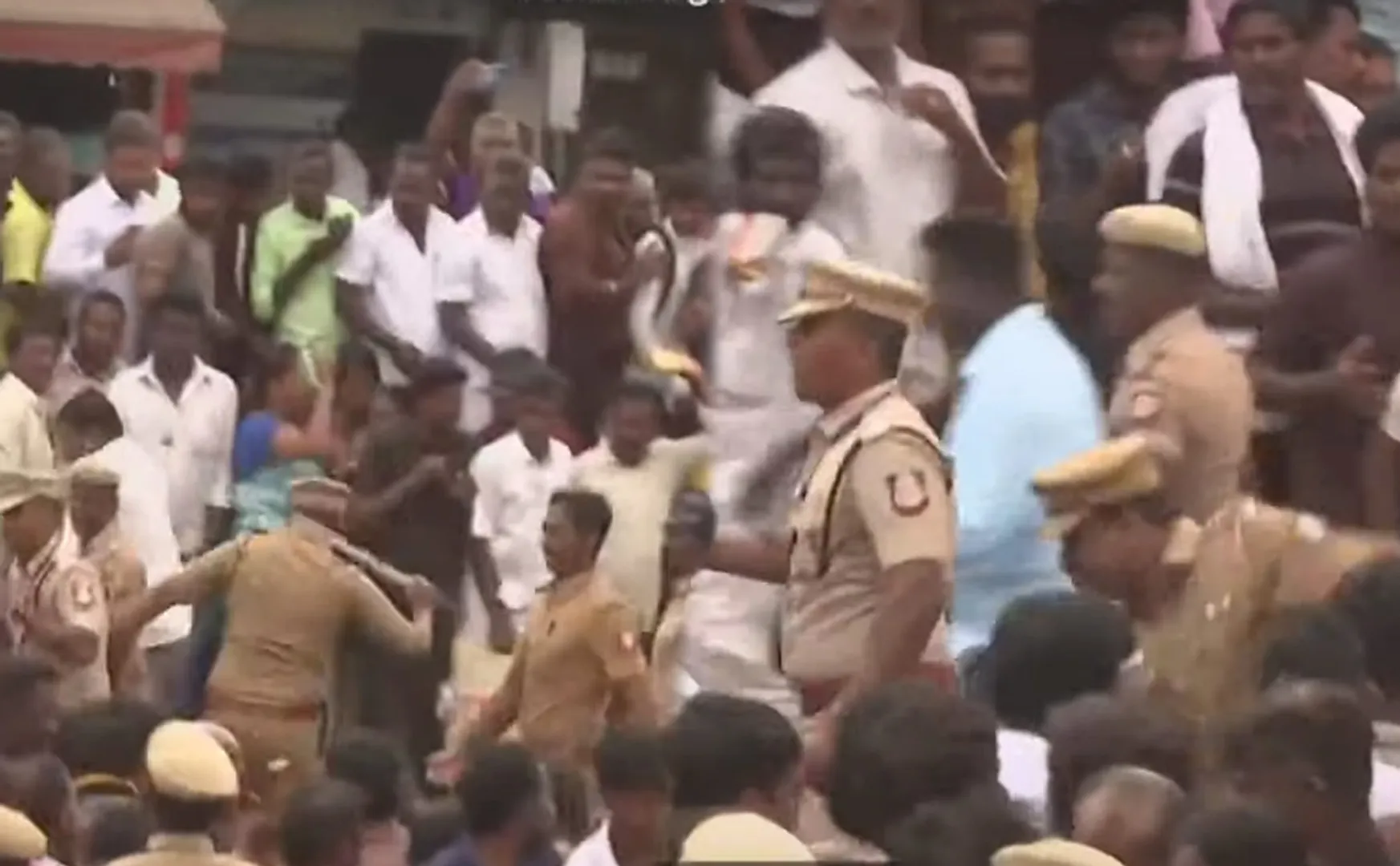 Police baton in front of the Dmdk office!