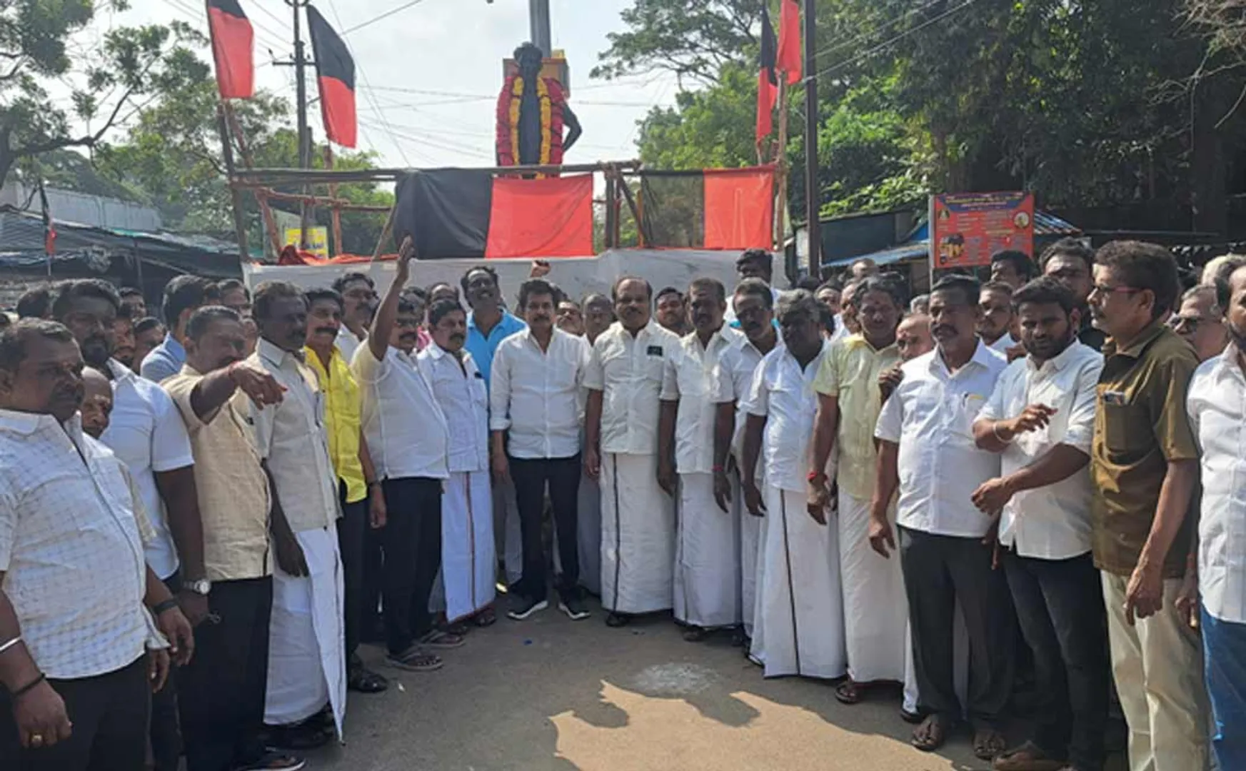 Political parties paid tribute to the statue of language war martyr Rajendran