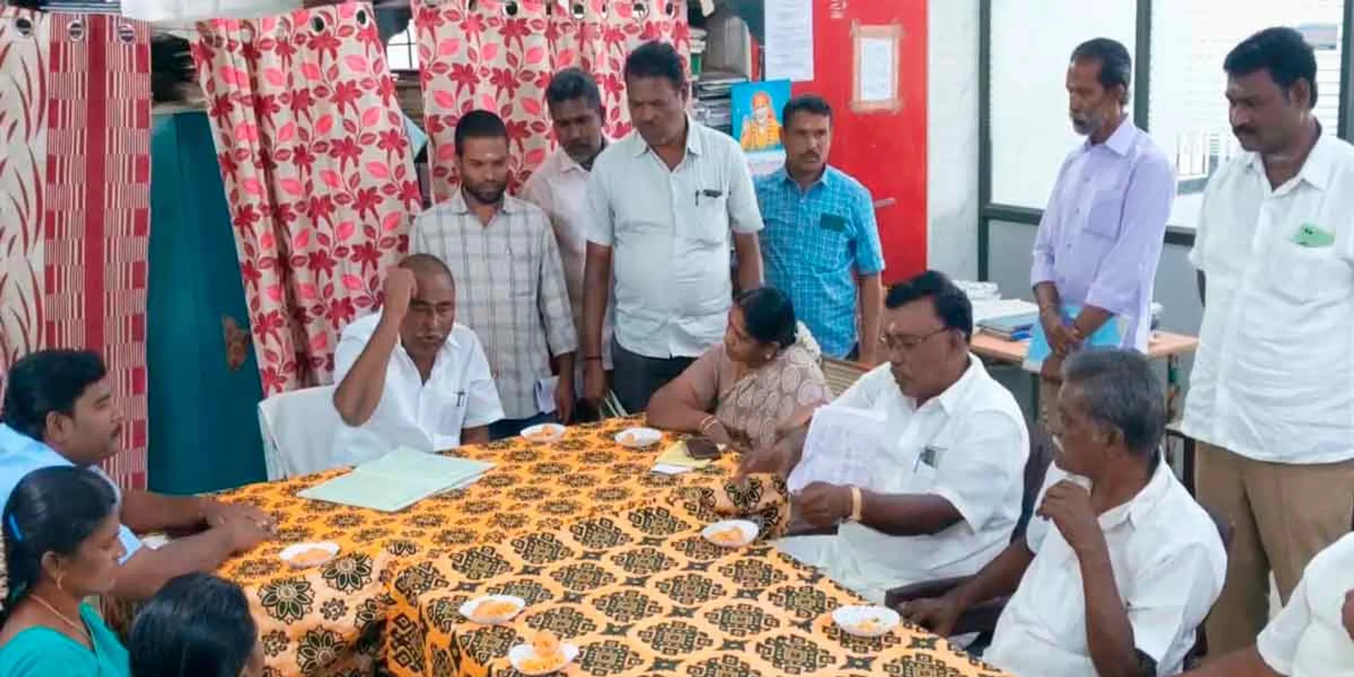 A heated argument between the district president DMK district secretary!