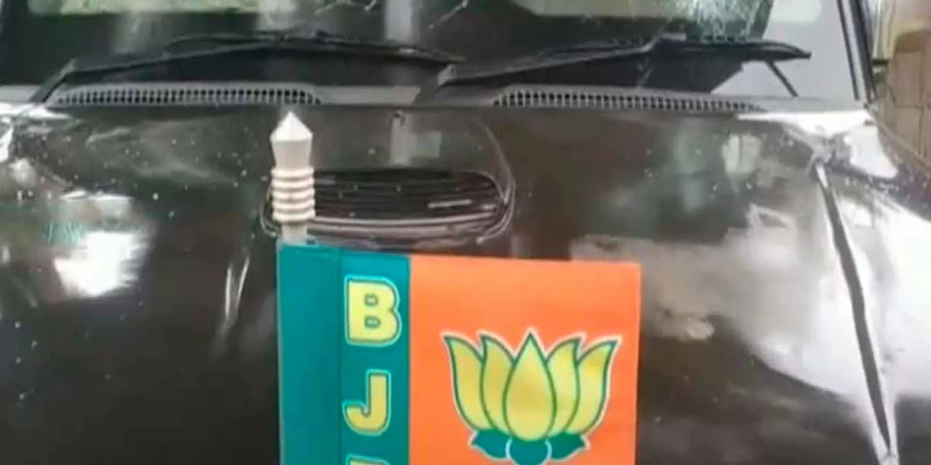 BJP district executive's car; 4 arrested