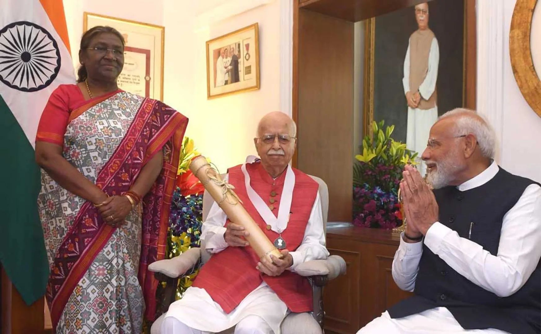 President Draupadi Murmu was made to stand while presenting the award to Advani