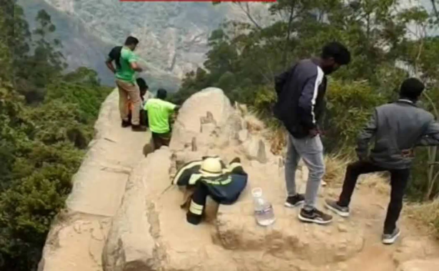 young man trapped in a 100-foot ditch in Kodaikanal in the style of the film 'Manjummel Boys'