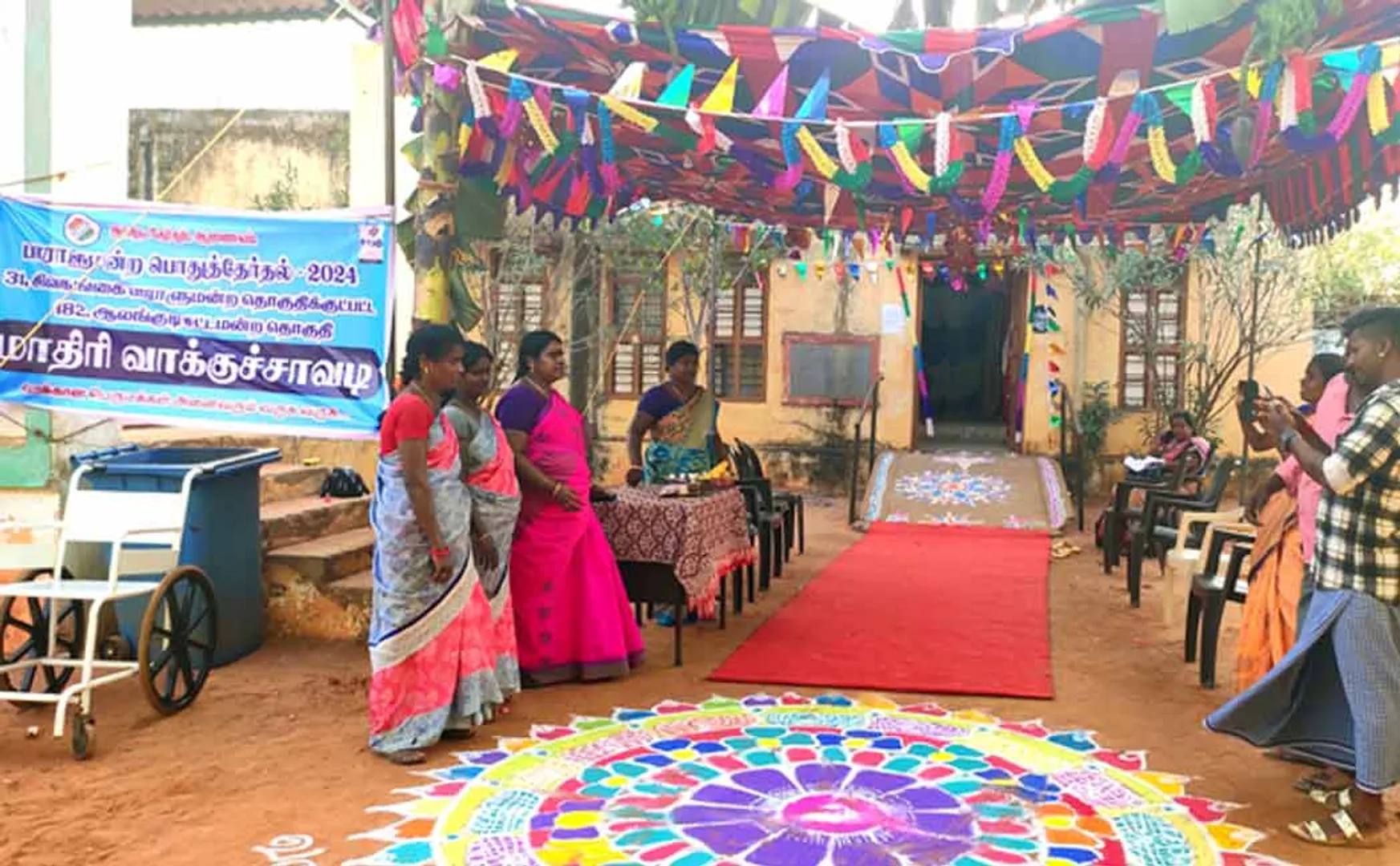 Voting registration center ready with banana trees
