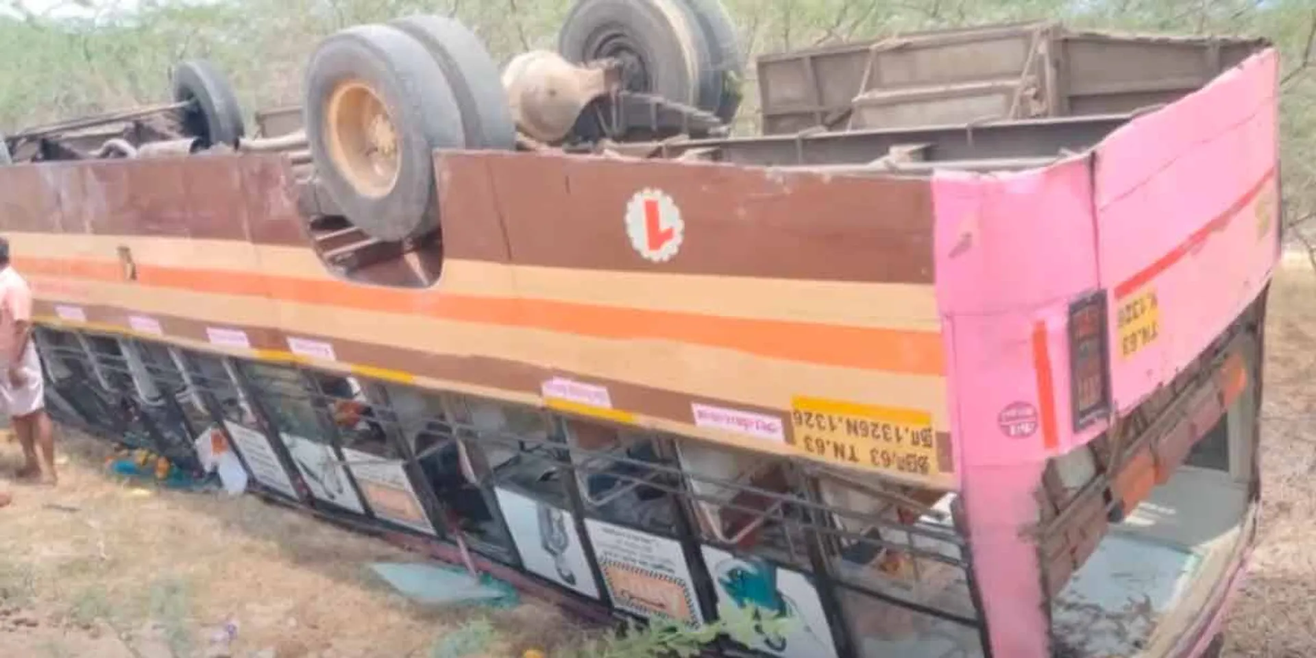Cell phone distracted attention; A government bus overturned