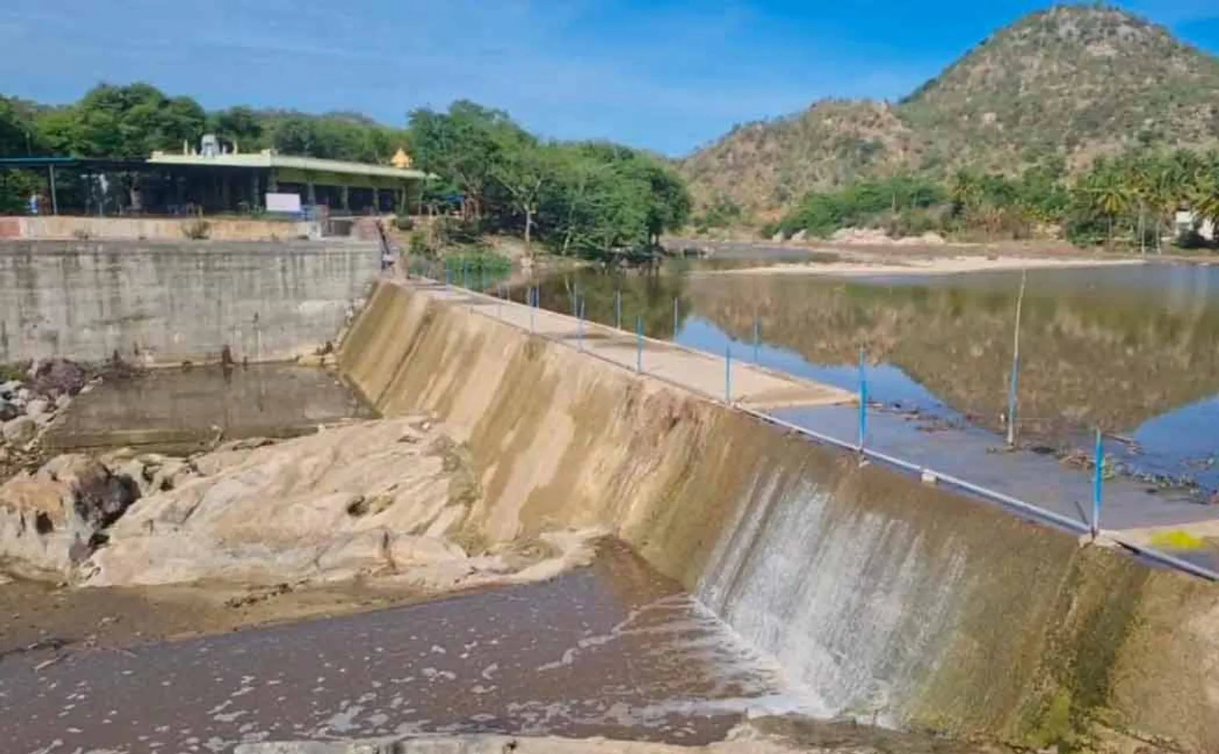 Pugalur barrage across the river was full