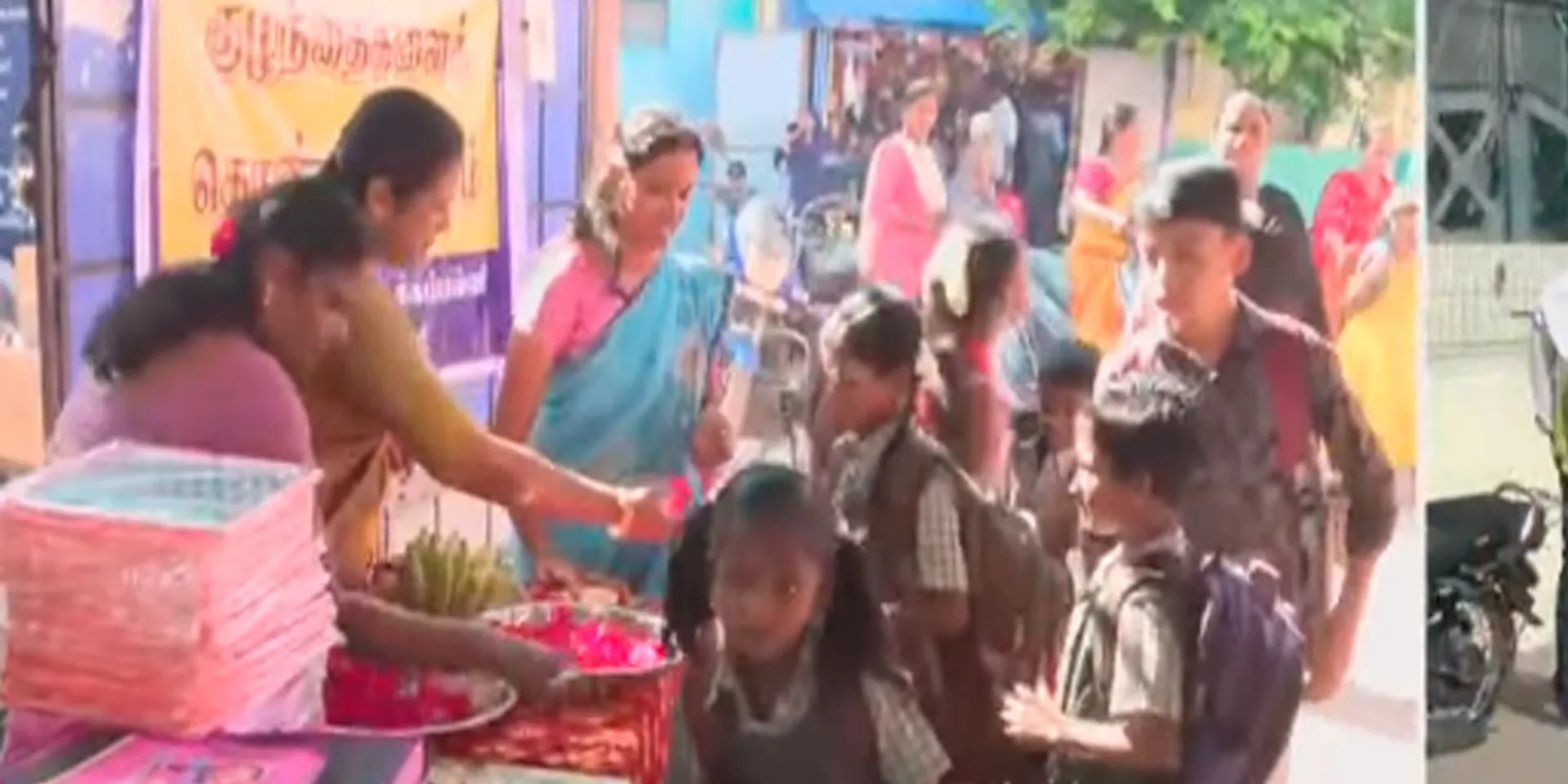 Teachers welcomed the students with flowers