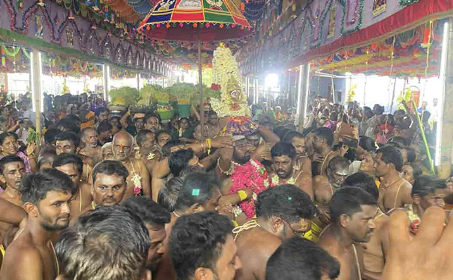 Devotees brought to the temple with knives in their chests
