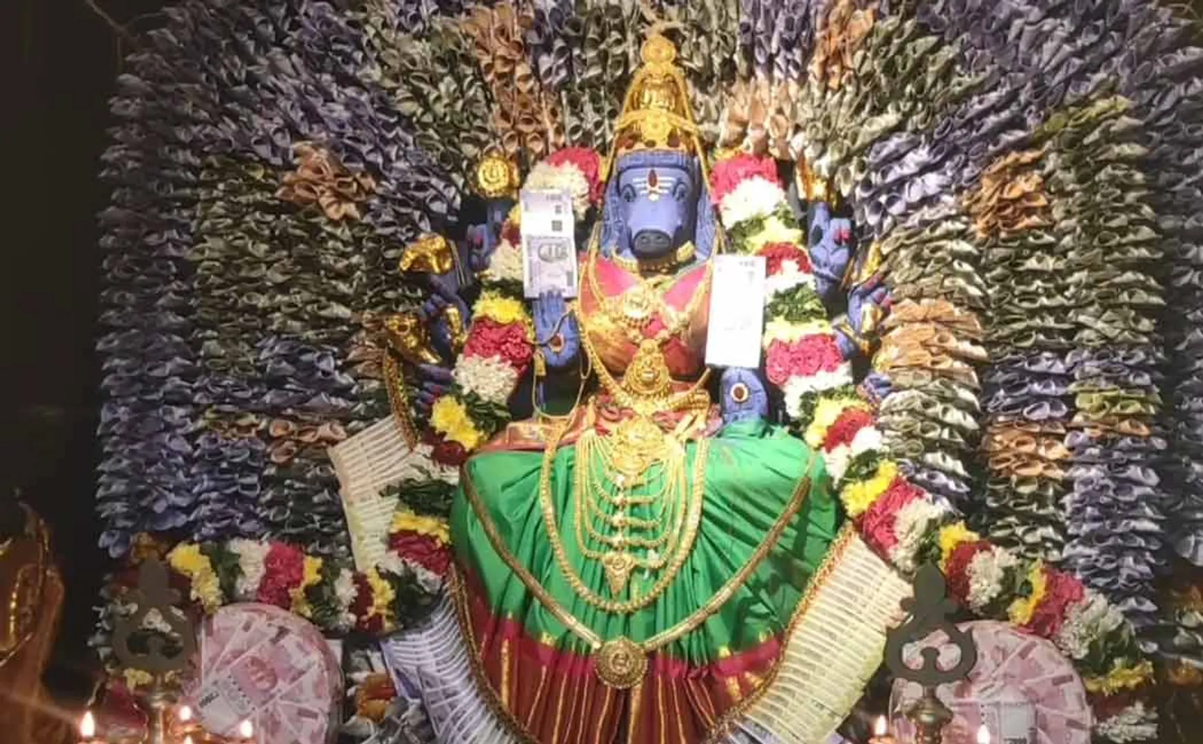 Swami was decorated with money worth Rs.11 lakh