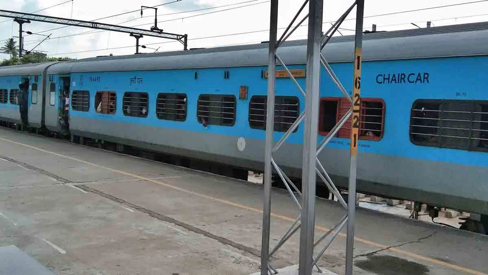 Throwing liquor bottles on a moving train; Passengers fear