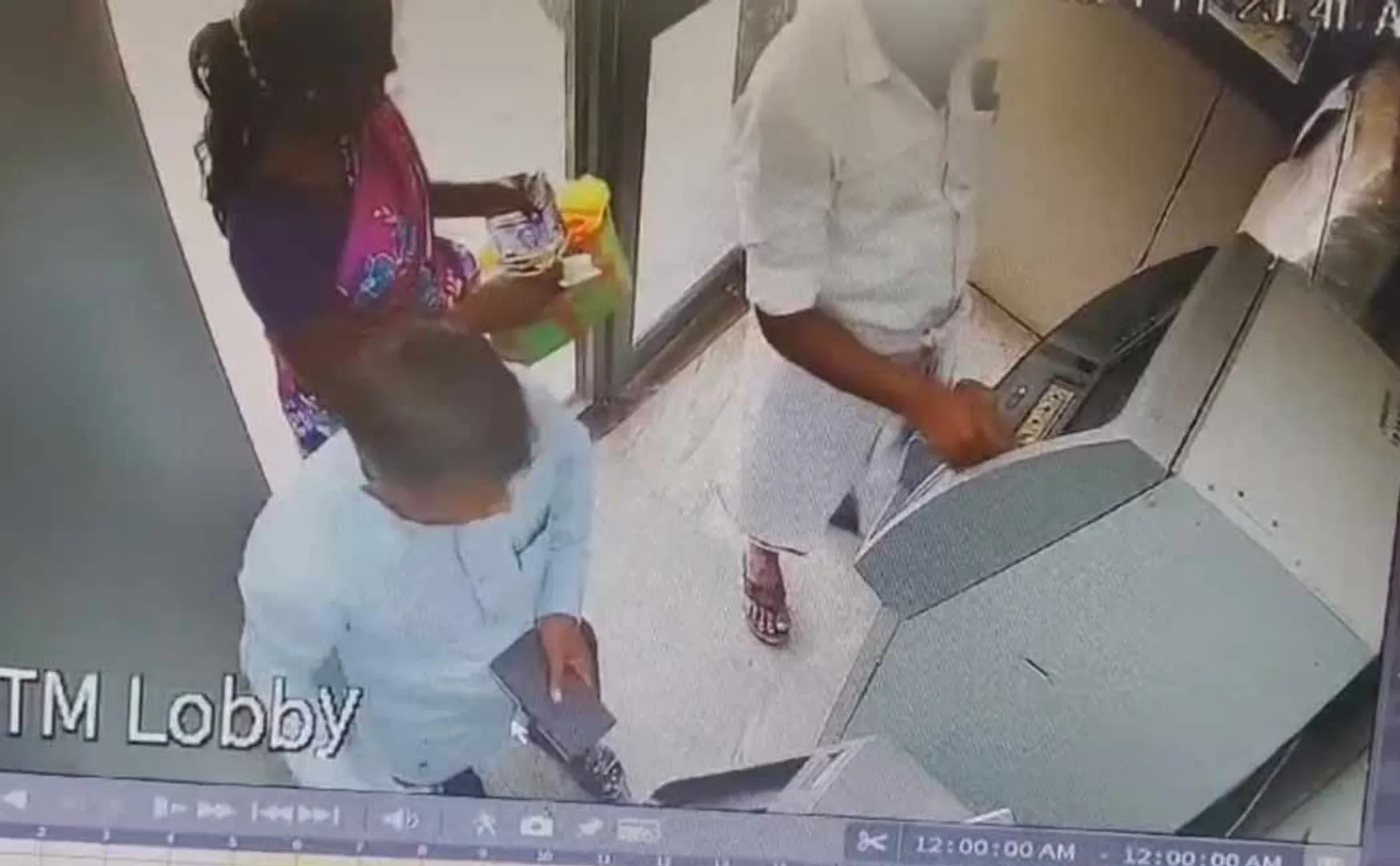 young man cheated a woman and stole money from an ATM