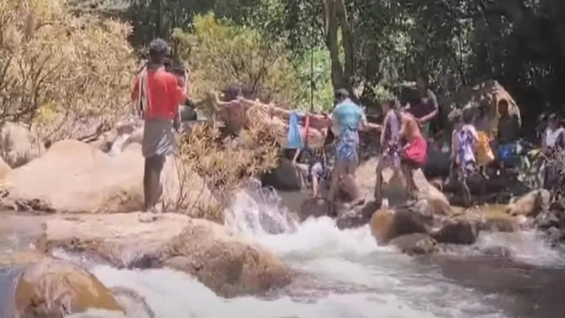  no road; Woman lose their live in dolly carried away