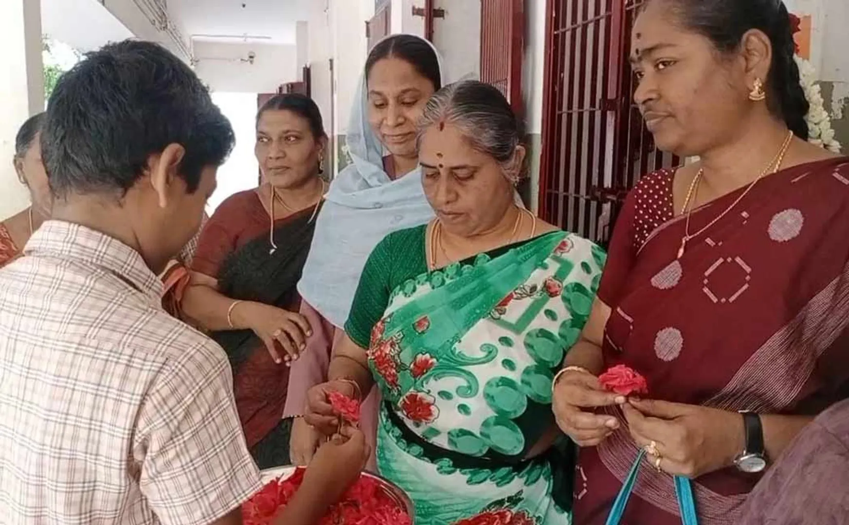 School students paid respect to the teachers by throwing flowers 