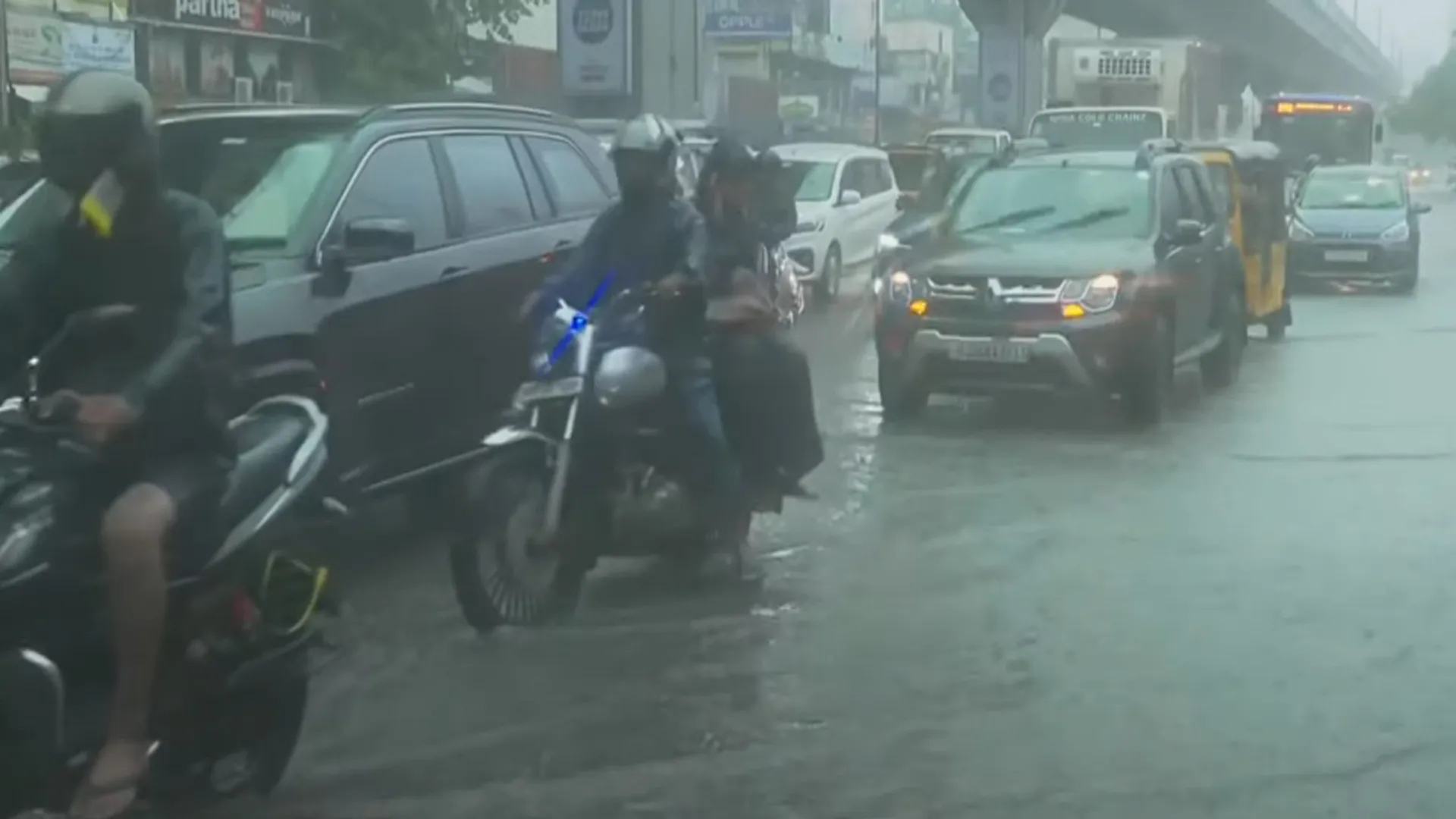 Standing rain water; 100 foot traffic diversion on the road