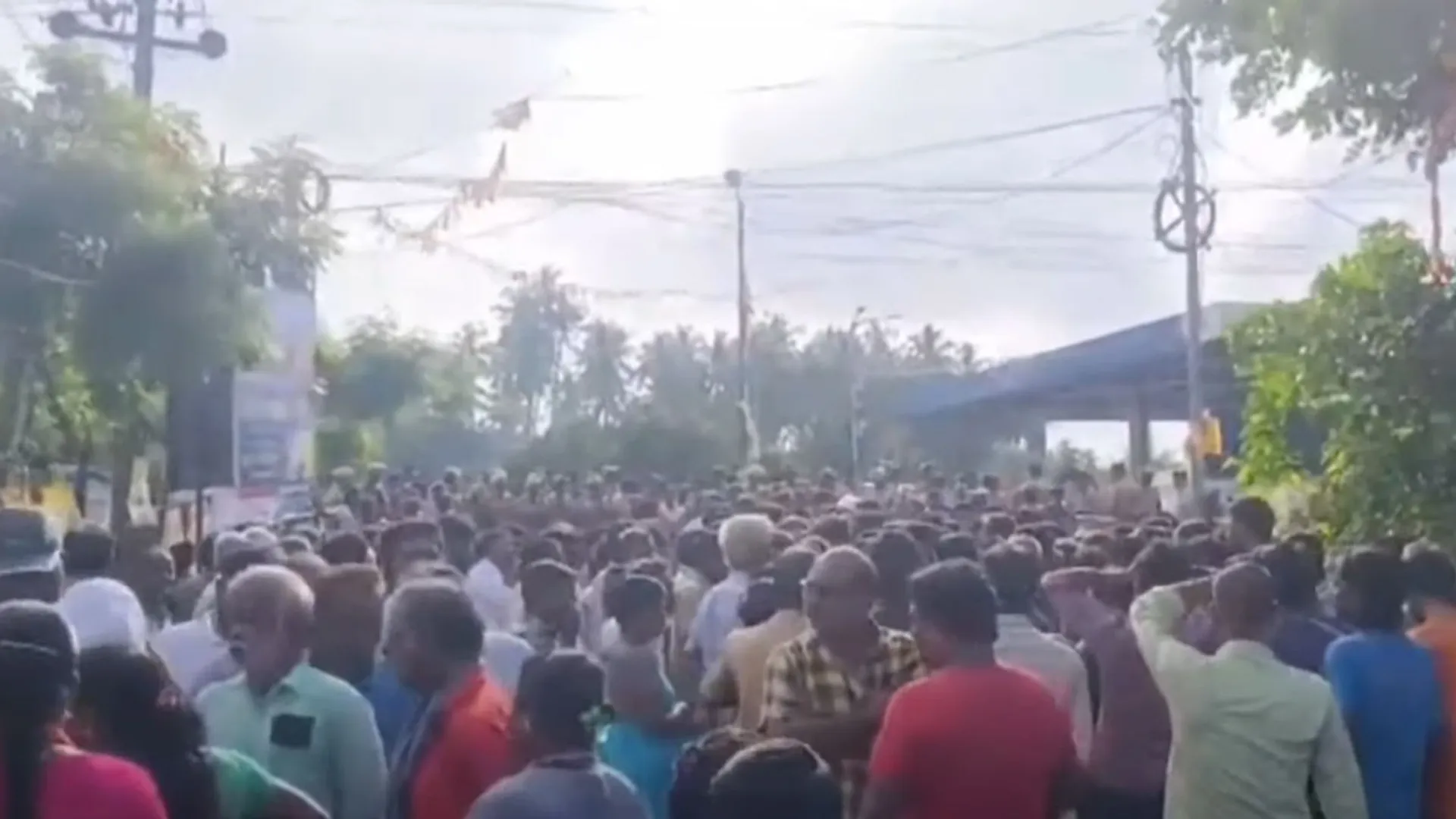 Officers who came to clear the encroachment; Koladi public protest