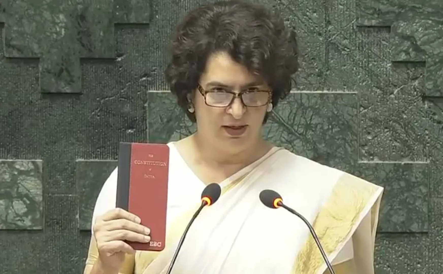 Priyanka Gandhi sworn in as MP with constitution book
