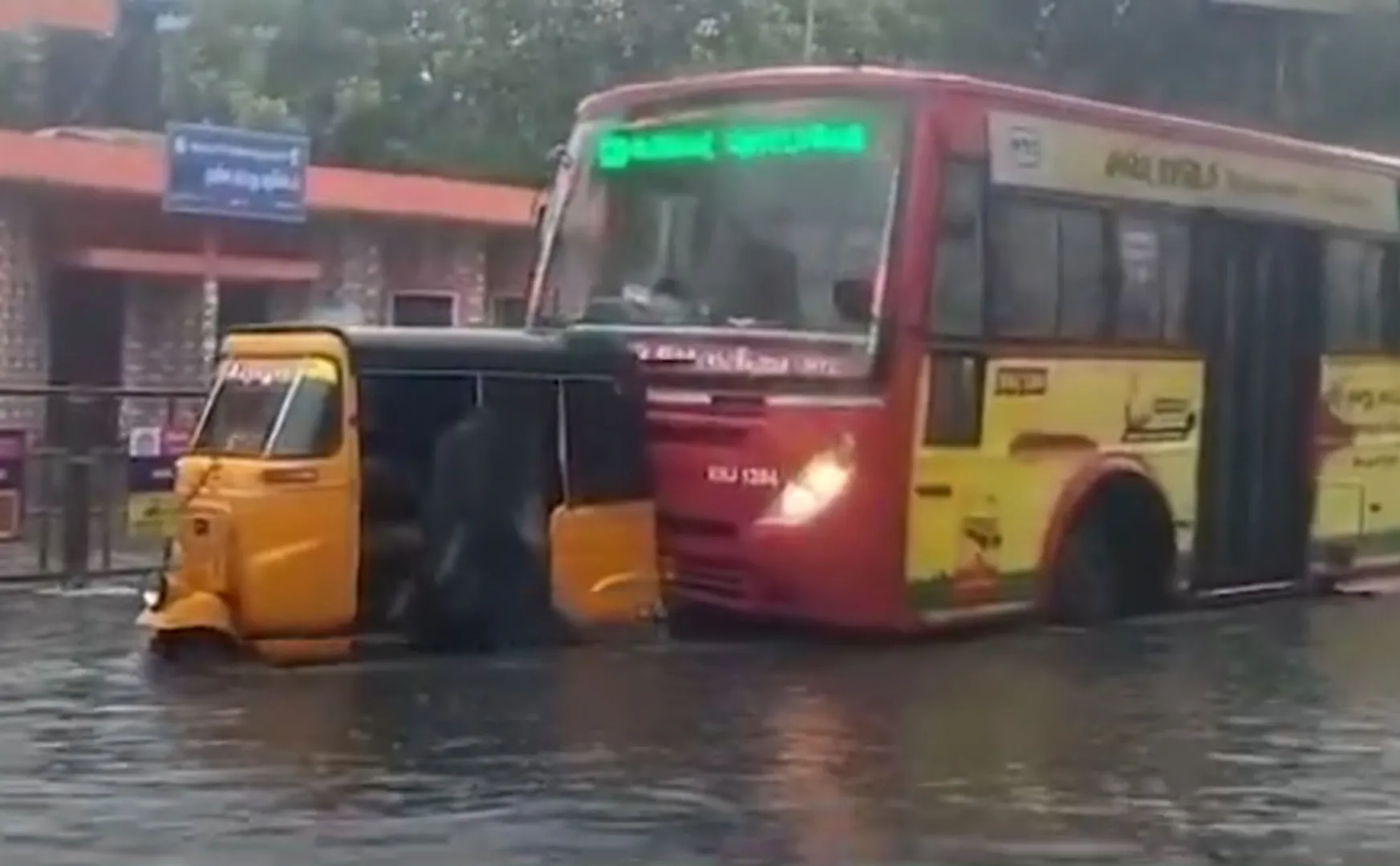 government bus extended a helping hand to an auto stuck in a rain