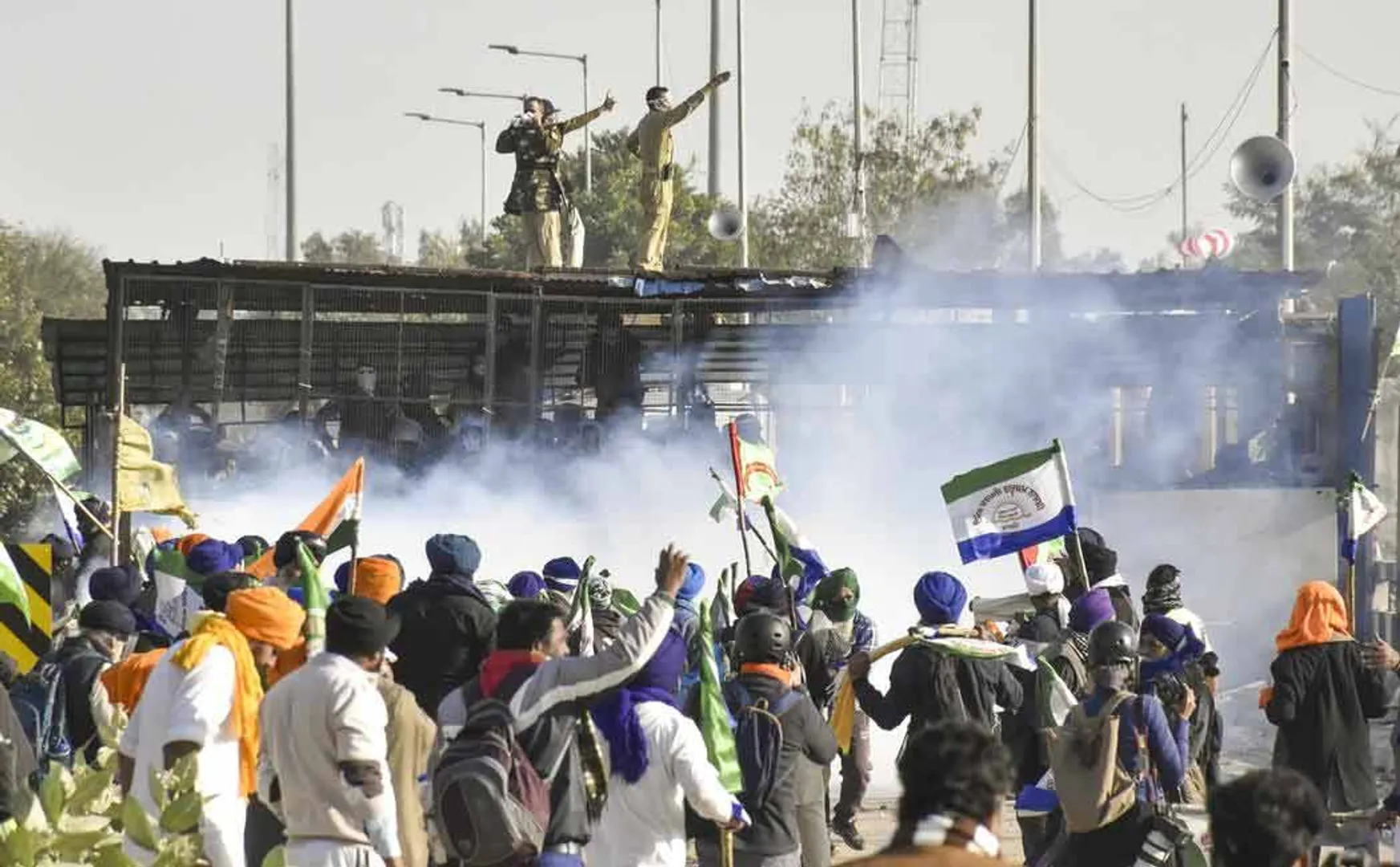  Police throwing smoke on Farmers of Punjab who led the struggle