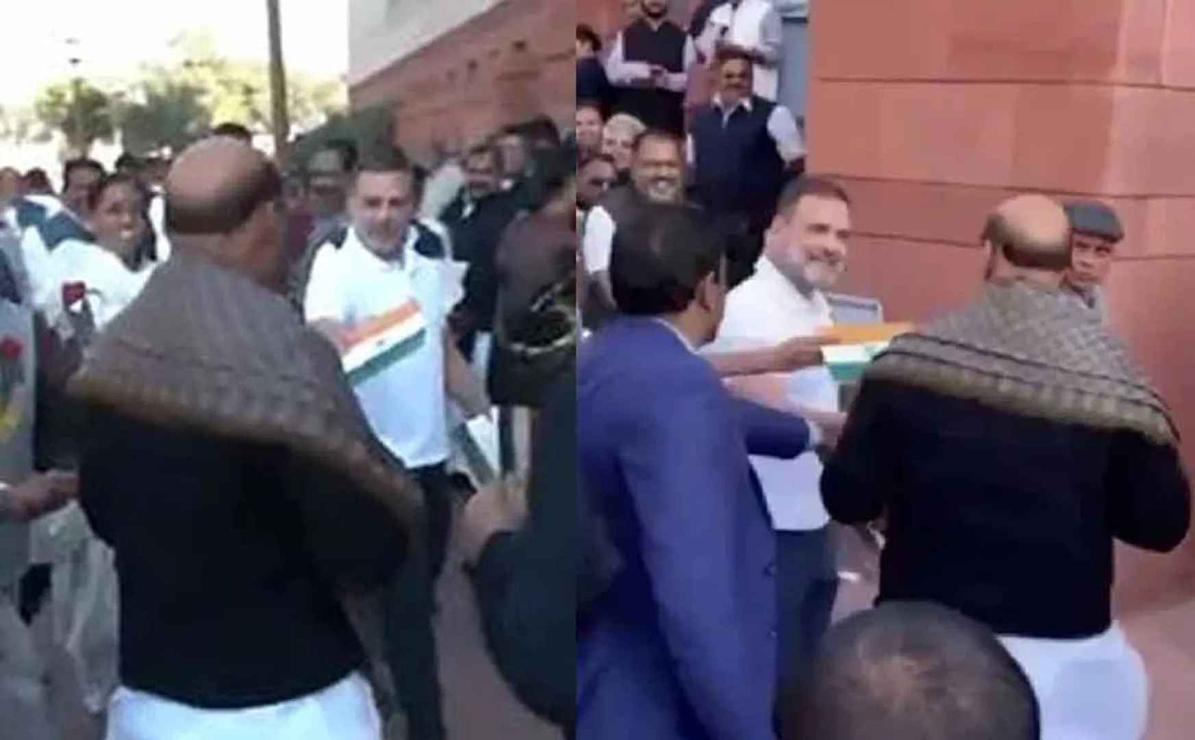 Rahul Gandhi gives rose to Union Minister Rajnath Singh