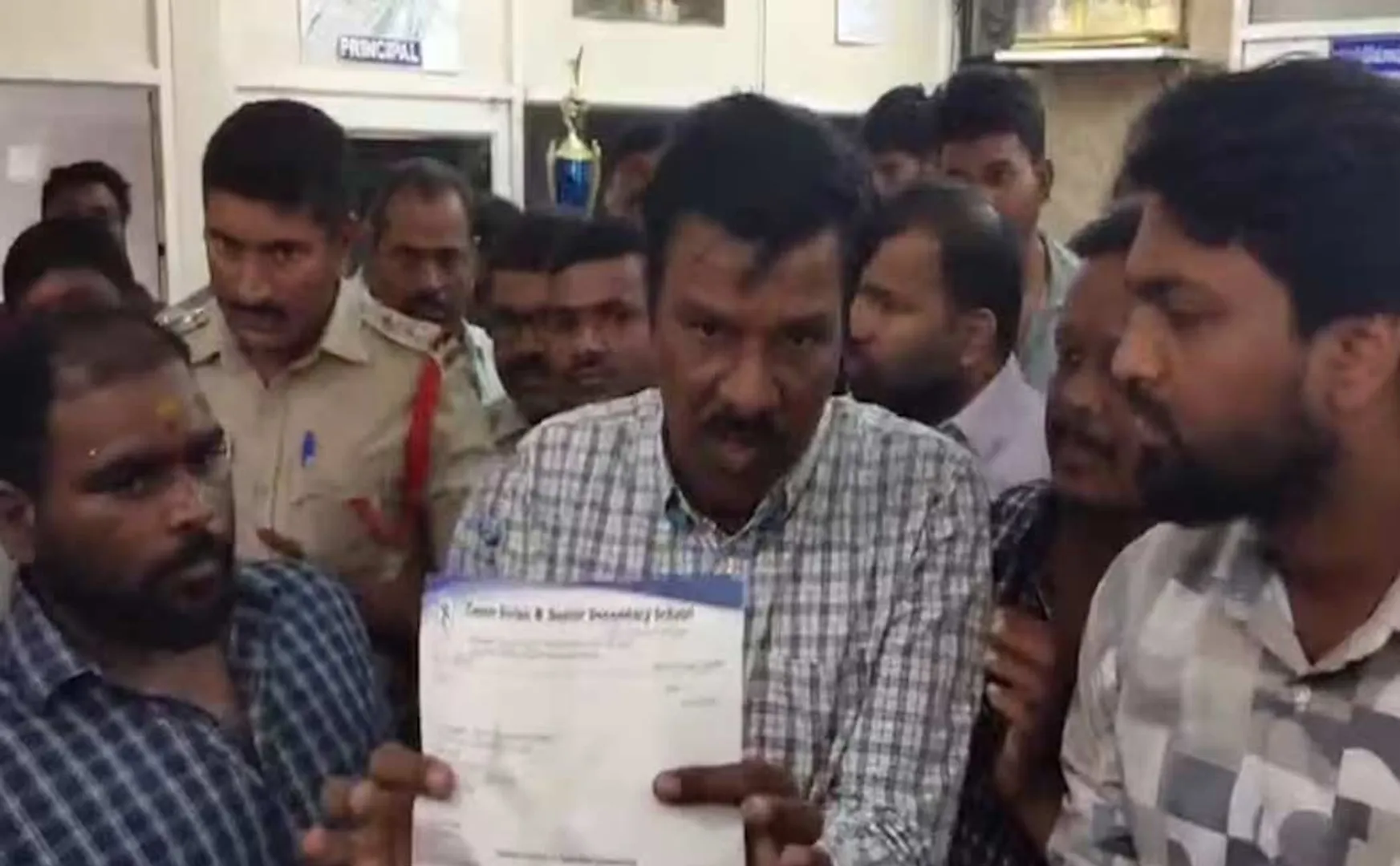 School principal hit students for putting a dot on their religious mark in telangana