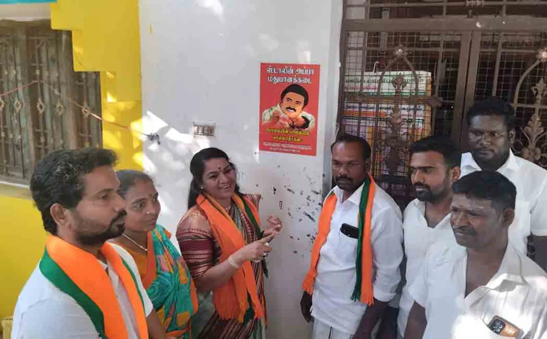 BJP women team pasted the CM mk stalin picture on TASMAC shops