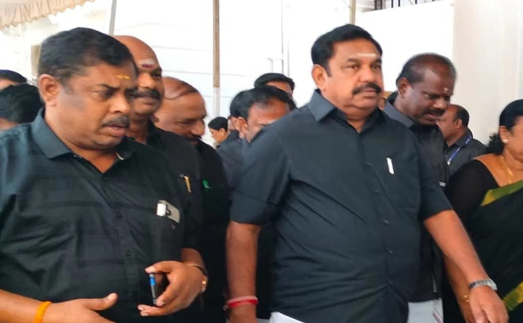  AIADMK members in black shirts