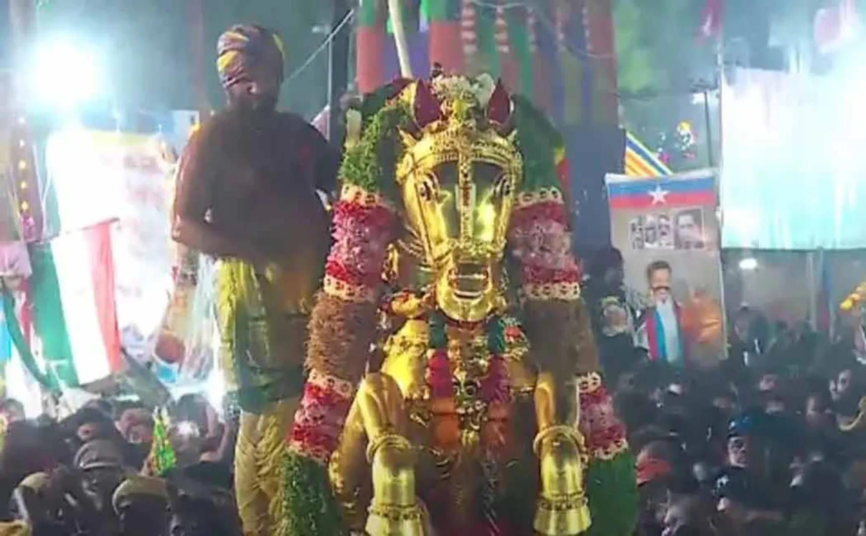 Kallazhagar appears to devotees on a golden horse in the Vaigai River