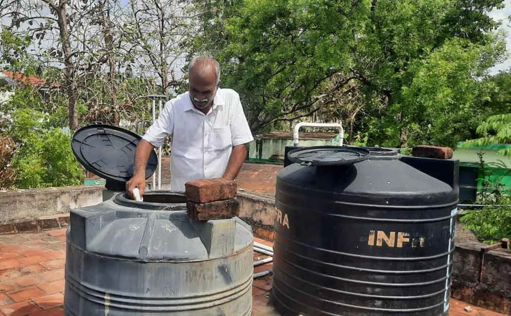 Headmaster cleans water tank heaps of praise