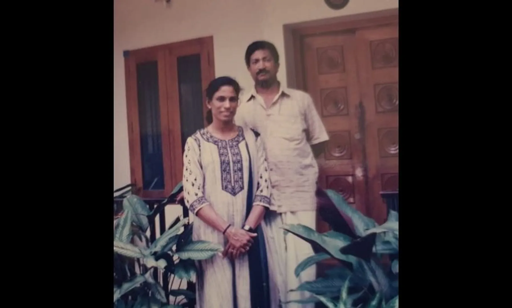 PT Usha and her husband