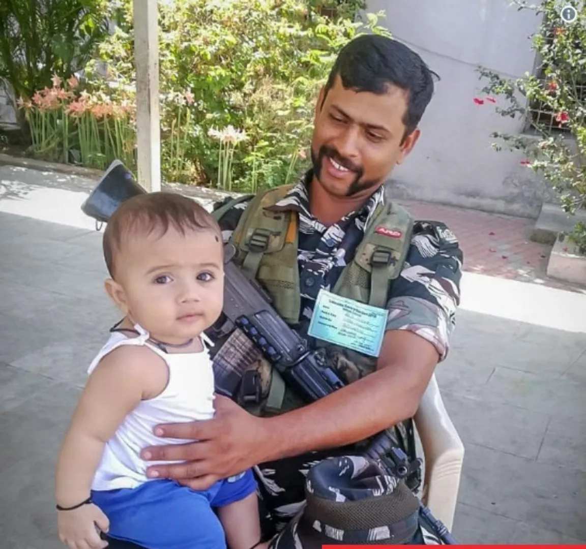 ପୋଲିଂ ବୁଥ୍‌ରେ କ୍ୟୁଟ ଫଟୋ: ମା’ କରୁଛନ୍ତି ମତଦାନ, ସୁରକ୍ଷାକର୍ମୀଙ୍କ କୋଳରେ ବସି ପ୍ରକ୍ରିୟା ଦେଖୁଛି ଶିଶୁ