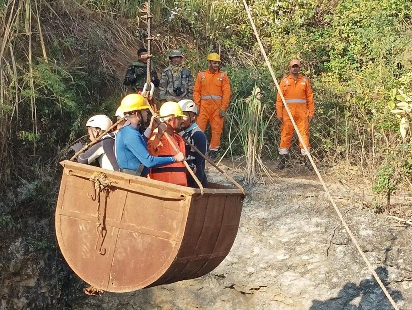 Assam coal mine rescue operation NDRF team rescuing workers in Assam