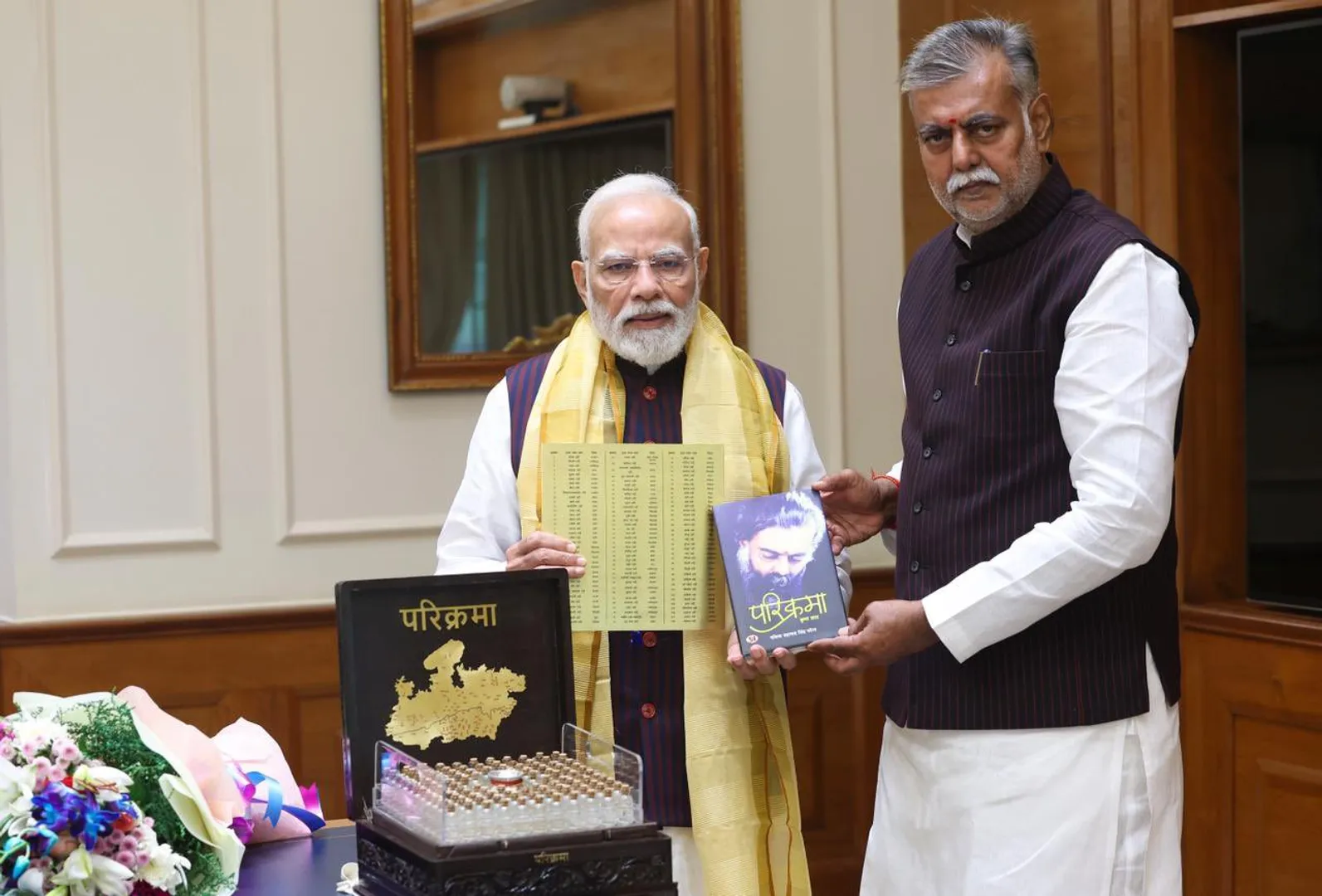 prahlad-patel-meets-pm-modi-presents-parikrama-kripa-saar-book