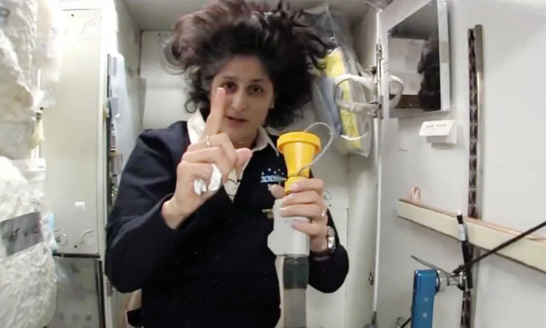 Why do female astronauts keep their hair down in space