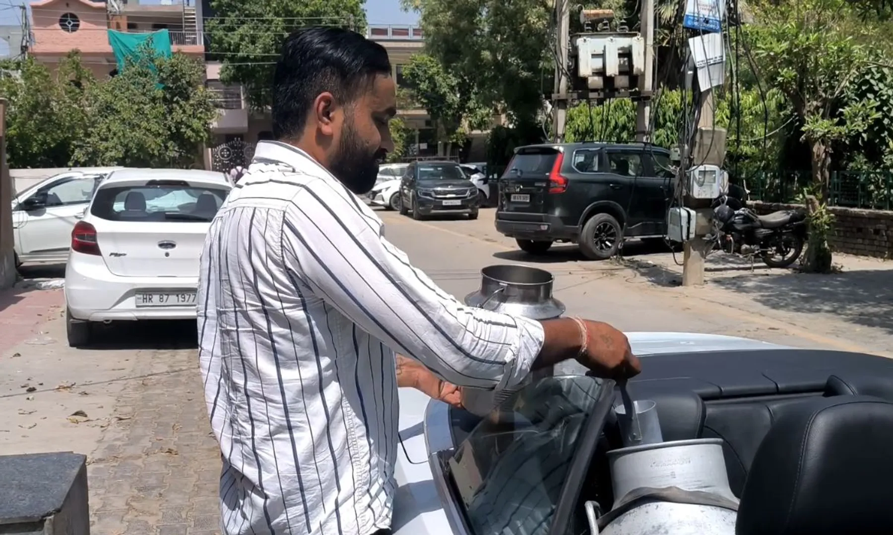 Haryana man quits bank job, delivers milk in Harley-Davidson, Audi  Watch