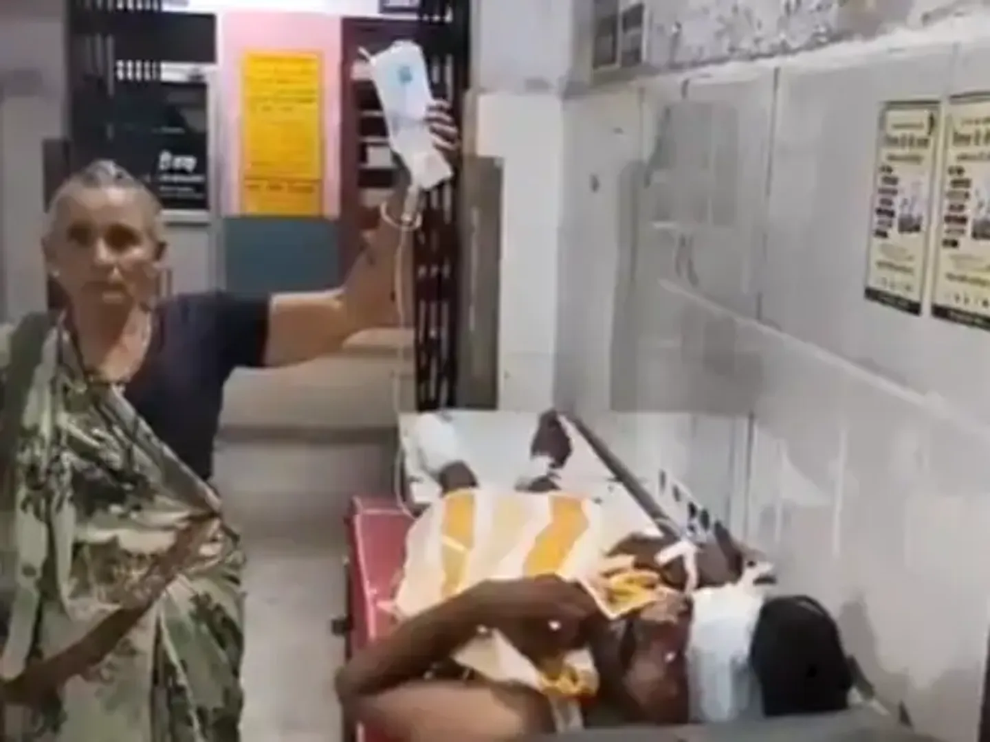 72-year-old-woman-holds-drip-bottle-for-30-minutes-for-injured-grandson-at-satna-hospital-staff-accused-of-negligence