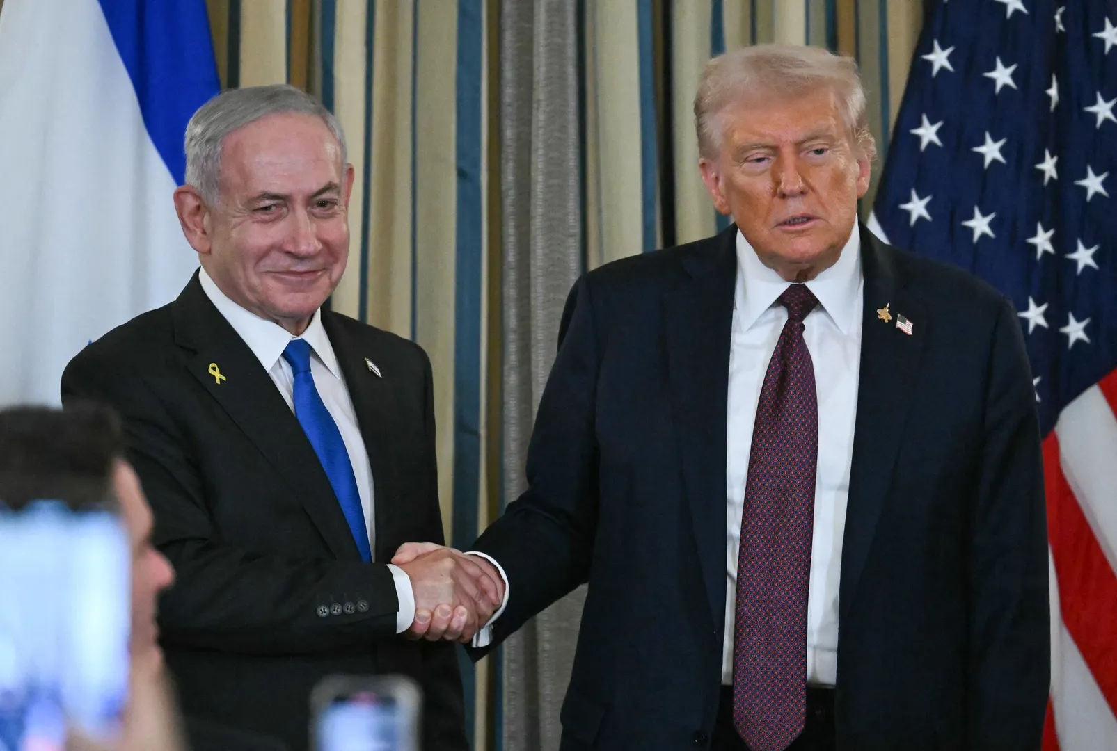 AFP__20250929__777284C__v2__HighRes__DonaldTrumpMeetsIsraeliPmBenjaminNetanyahu-1