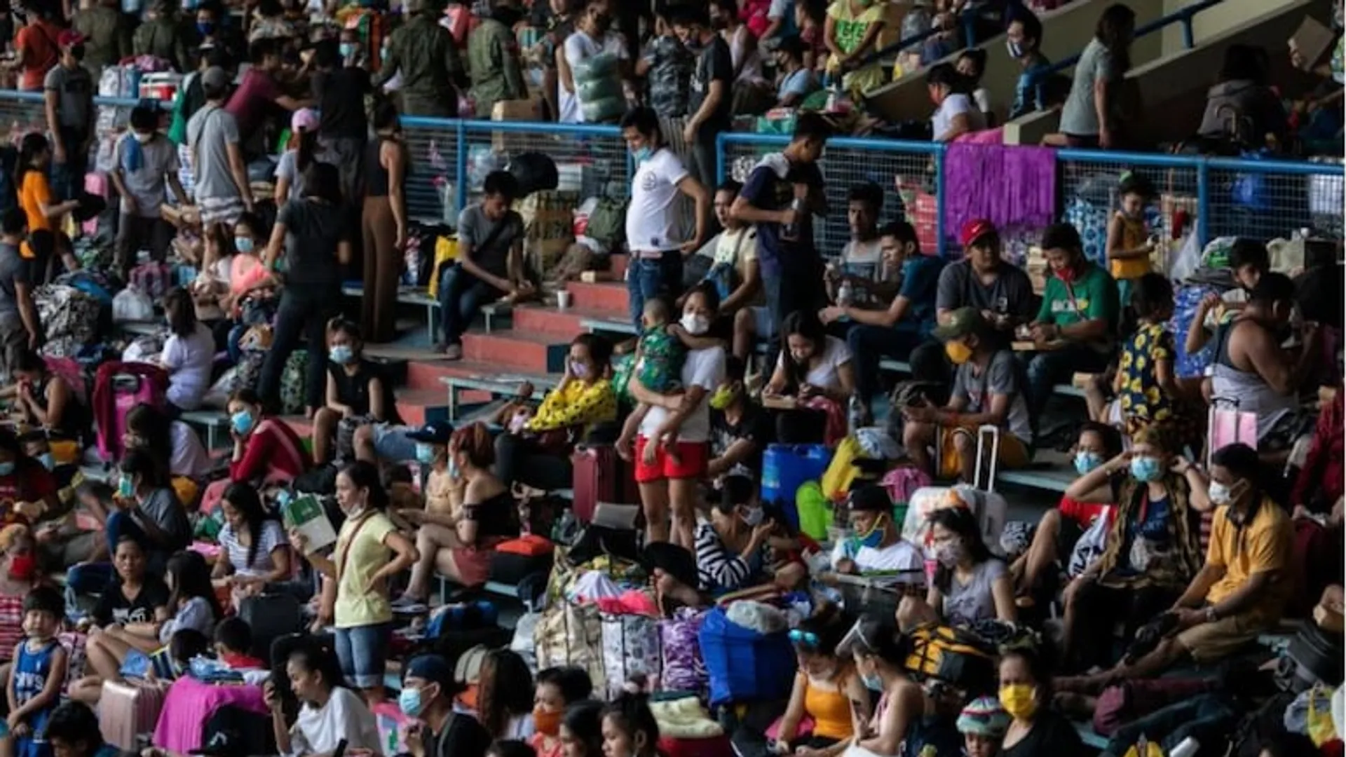 Thousands of stranded Filipinos crammed into baseball stadium amid coronavirus risks