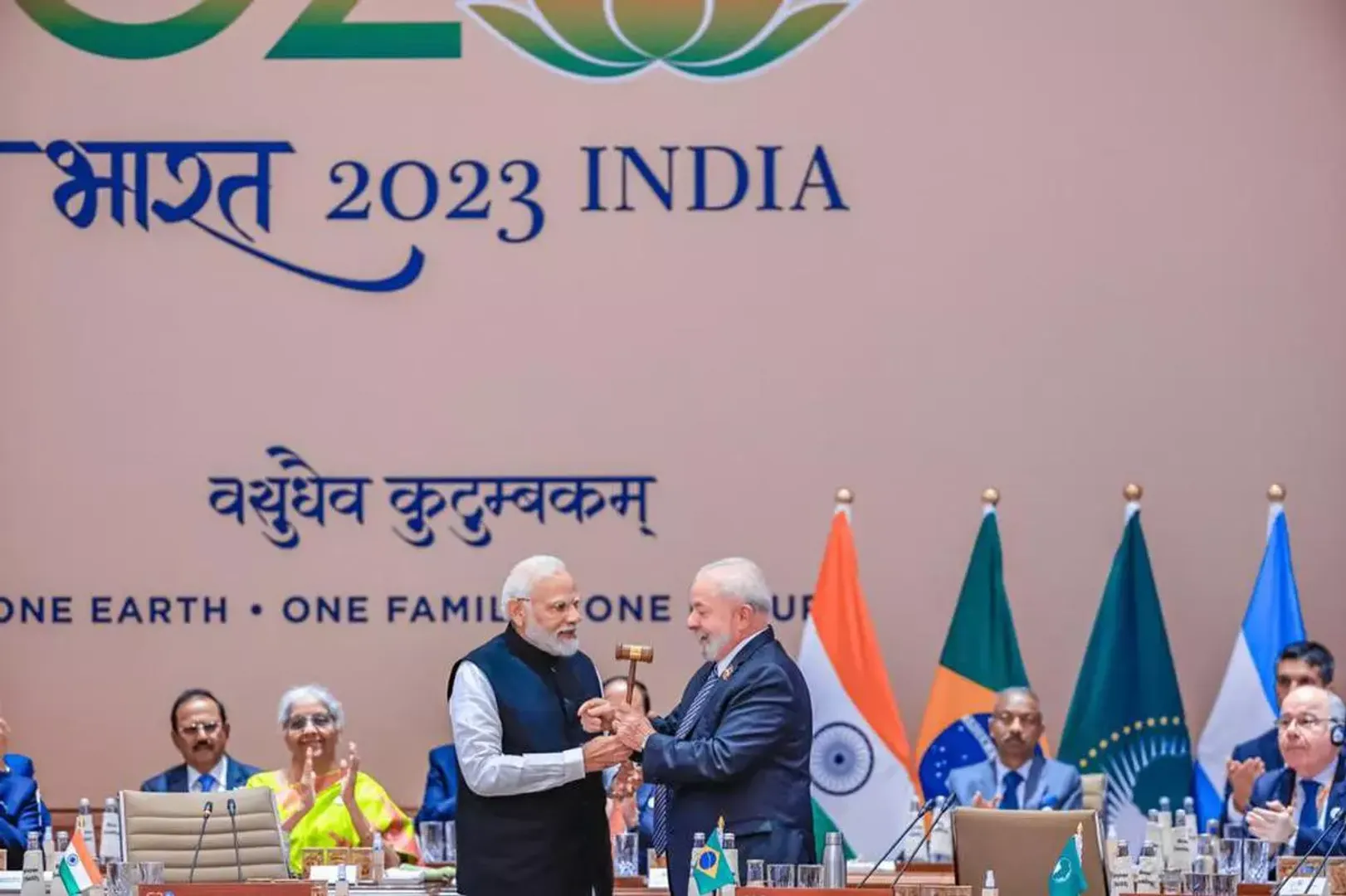 PM Modi presents the gavel for the G20 presidency to the president of Brazil on the final day of the summit in India
