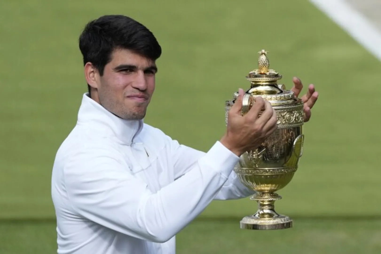 Carlos Alcaraz defeats Novak Djokovic to claim back-to-back Wimbledon titles