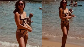 Kareena Kapoor sets the beach on fire in this bold swimsuit look –