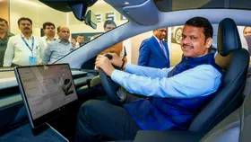 As Tesla opens first showroom in Mumbai, Fadnavis hopes for local production