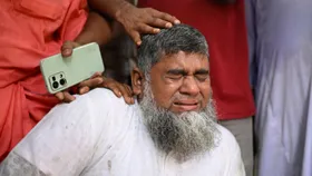 Grief, angst continues as toll in jet crash on school rises to 32 in Bangladesh