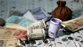 Rupee slips 24 paise to 87.15 against US dollar in early trade