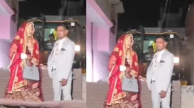 JCB पर खड़े होकर शादी में एंट्री लेते नजर आए दूल्हा-दुल्हन, वीडियो देख ट्रोल हुए कपल
