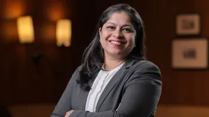 Dia Rajdev as Director of Events