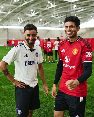 United in Manchester: Indian cricket team meets Man United footballers at the Old Trafford Stadium on Sunday. Photo credit: BCCI